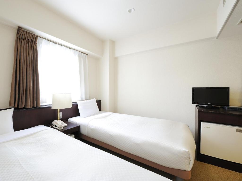 Sendai Business Hotel Ekimae Zimmer foto